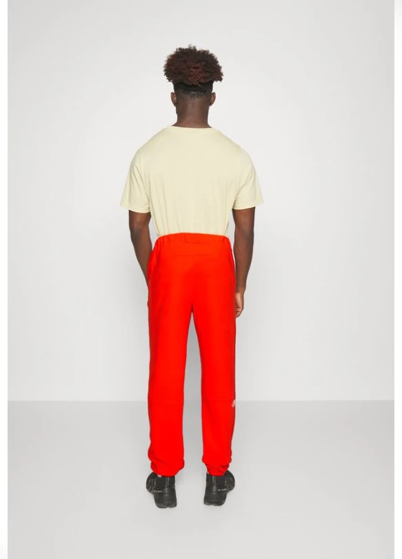 1_Pantalones Deportivos GLACIER PANT en Fiery Red a Solo 41.45€